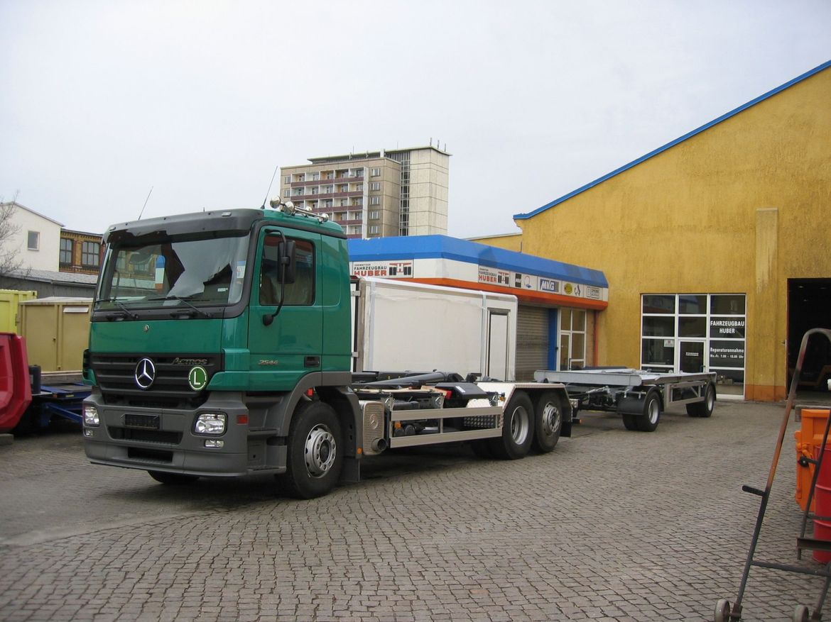 MAN Abrollkipper mit Anhänger für Abrollcontainertransporte